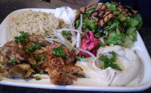 Chicken mousahab with rice, hummus, fatoush salad and pickled beets, $12.99.